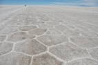 Kevin far off in the distance. The Salar de Uyuni (though not the smaller one I'll talk about next time) has this hexagon shaped natural marks all over the whole thing.